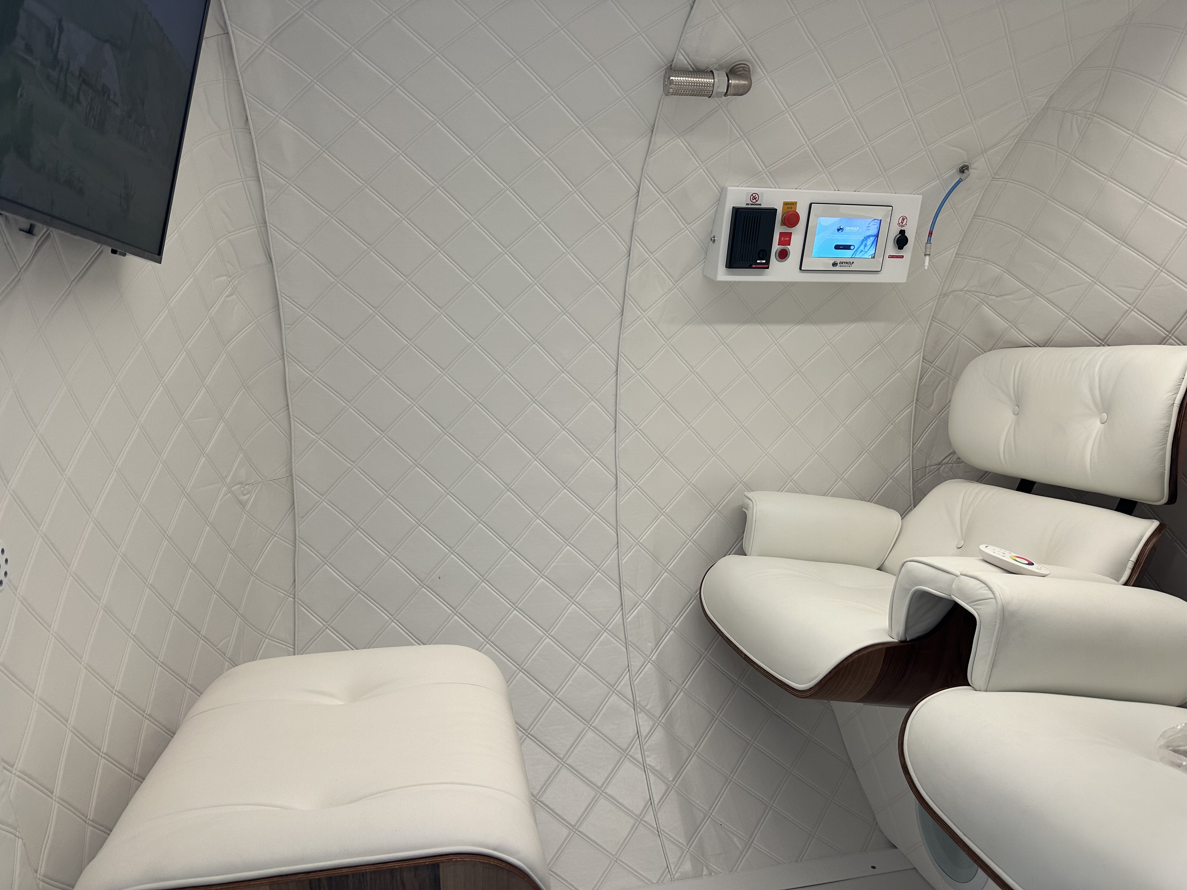 Inside the clinic’s two-seat hyperbaric chamber, with comfortable seating and pressure controls